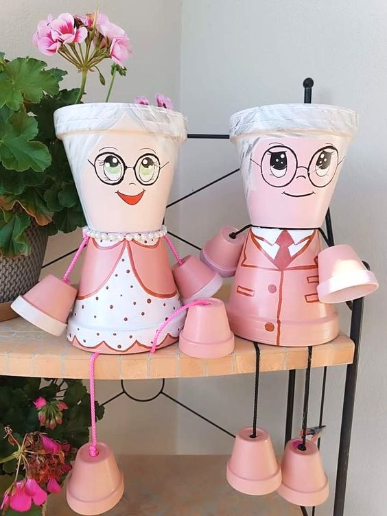 couples de personnes âgées en pots de fleurs / visiondeco